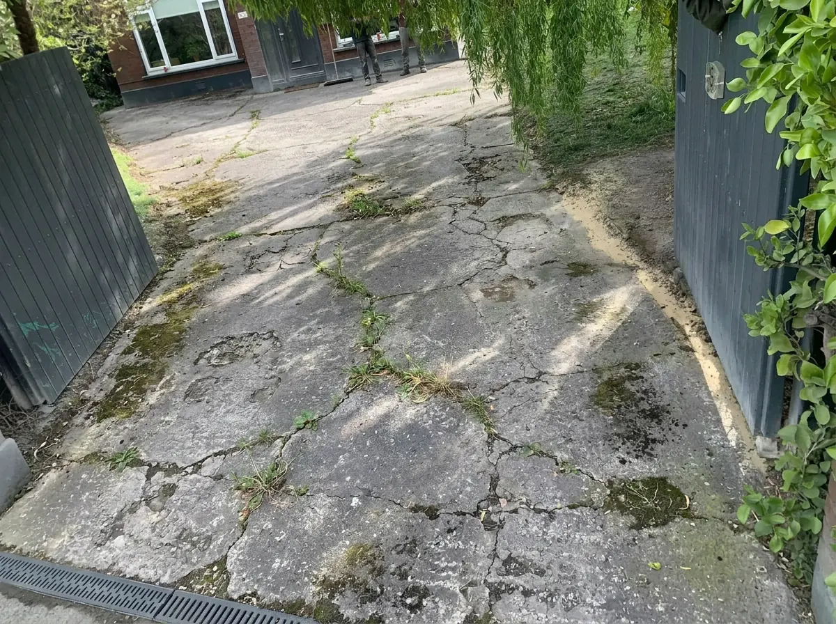 Before: old worn driveway
