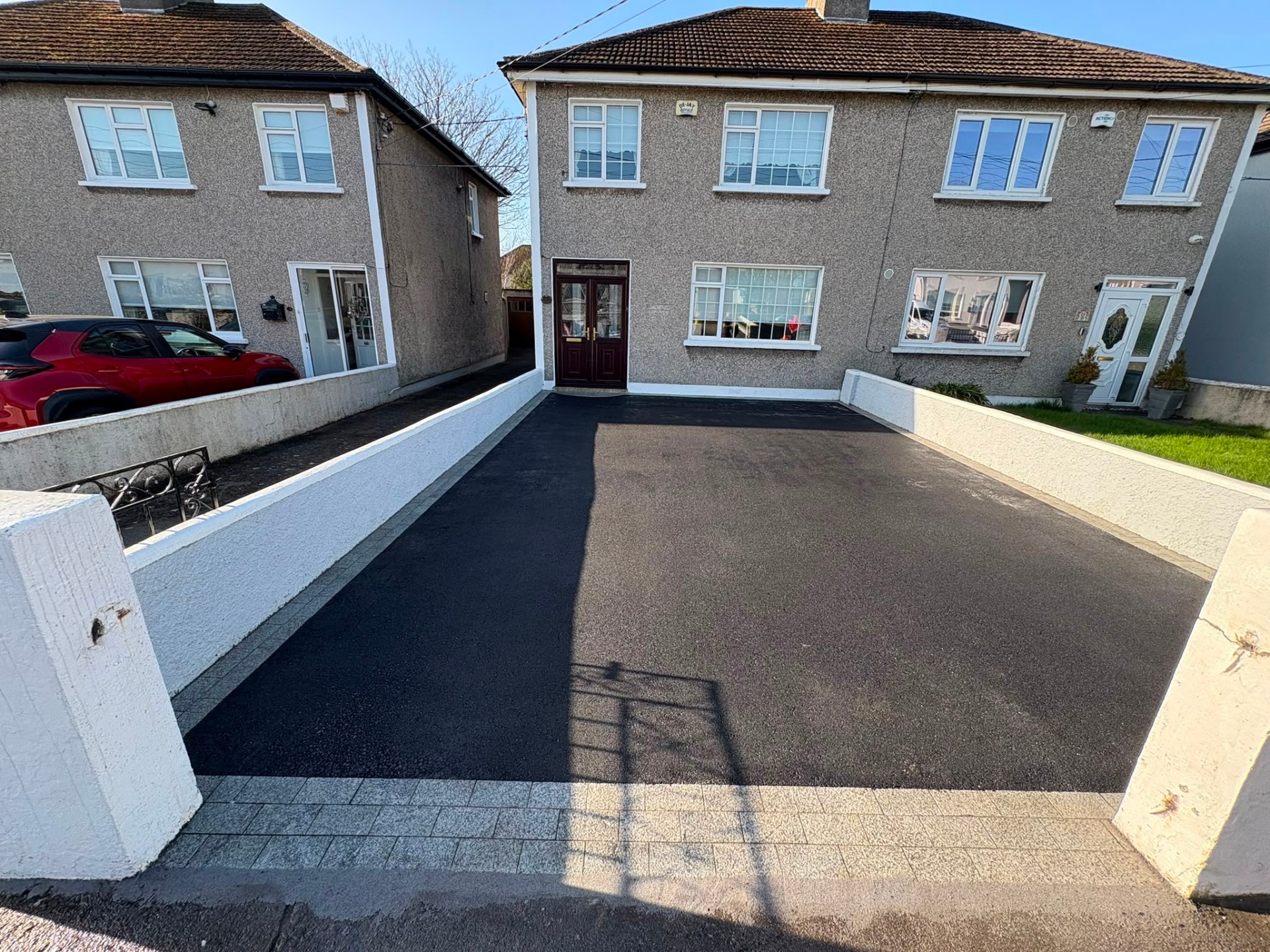 Fresh smooth tarmac driveway with paved apron in Swords, Co. Dublin